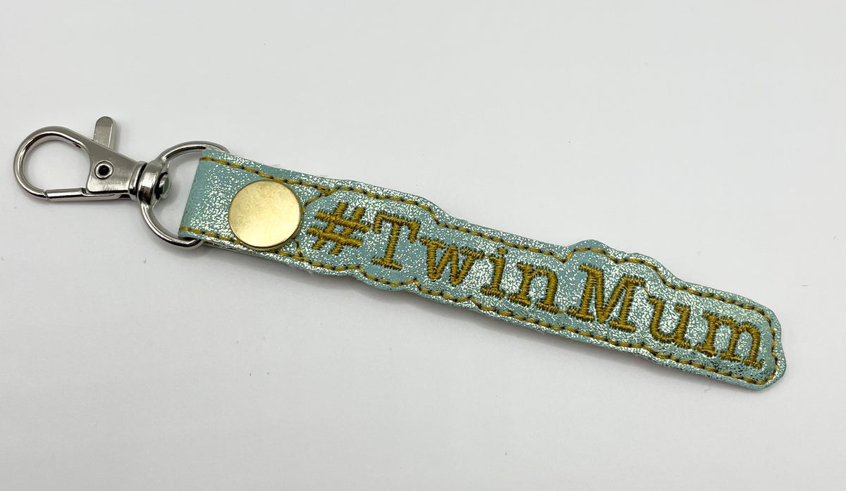 Golden Shimmer Twin Mum - Embroidered Key Ring Clip
